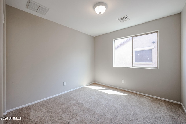 unfurnished room featuring carpet floors