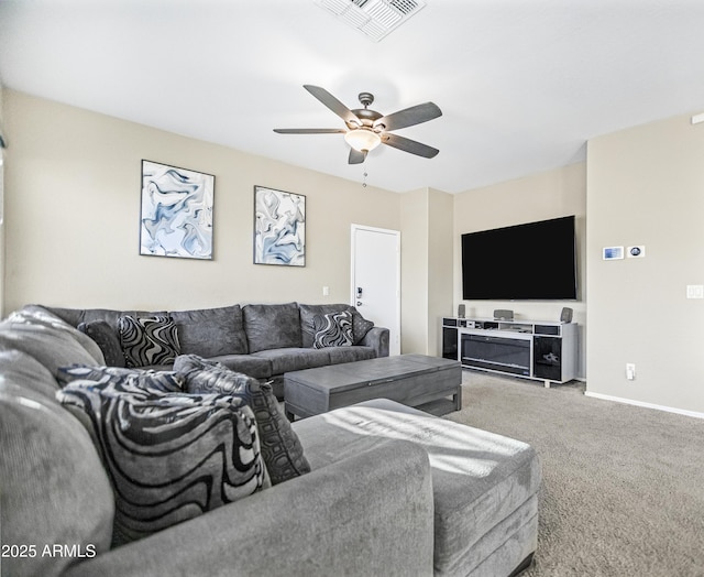 living room featuring carpet and ceiling fan