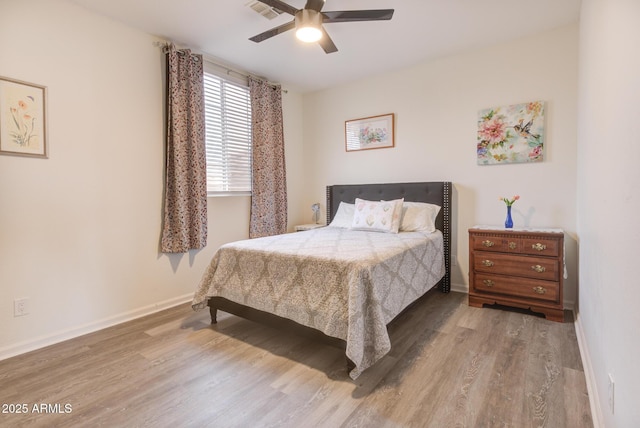 5940 W Robinson Way, Chandler, AZ 85226 - bedroom with wood finished floors, baseboards, and a ceiling fan