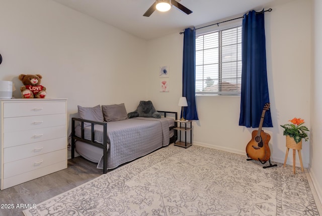5940 W Robinson Way, Chandler, AZ 85226 - bedroom with wood finished floors, baseboards, and ceiling fan