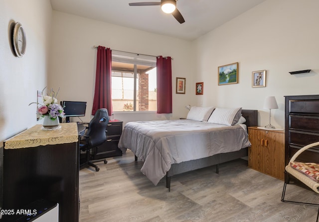 5940 W Robinson Way, Chandler, AZ 85226 - bedroom with light wood finished floors, a desk, and ceiling fan