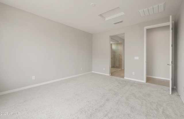 17633 W Palo Verde Dr, Litchfield Park, AZ 85340 - unfurnished bedroom featuring attic access, carpet floors, and connected bathroom
