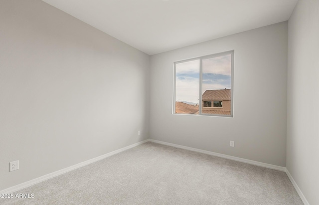 17633 W Palo Verde Dr, Litchfield Park, AZ 85340 - spare room featuring light carpet