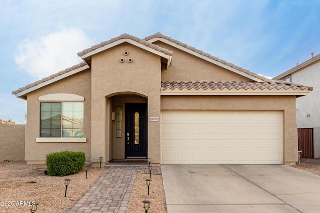 view of front of property featuring a garage