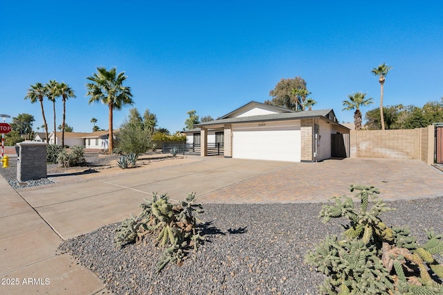 single story home with a garage