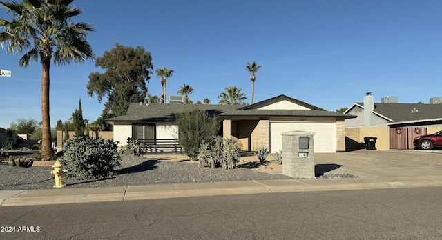 view of front of home with a garage