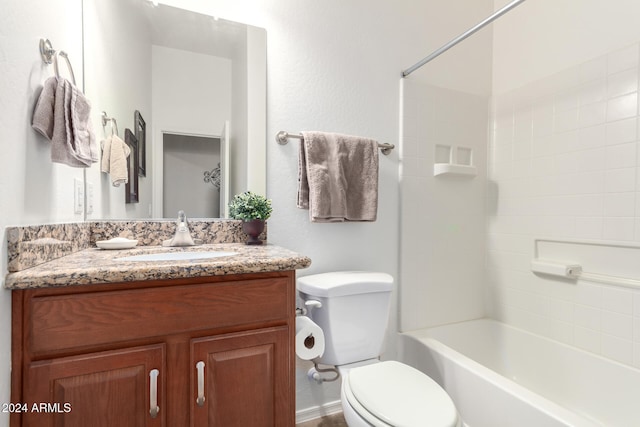 full bathroom featuring vanity, toilet, and tiled shower / bath