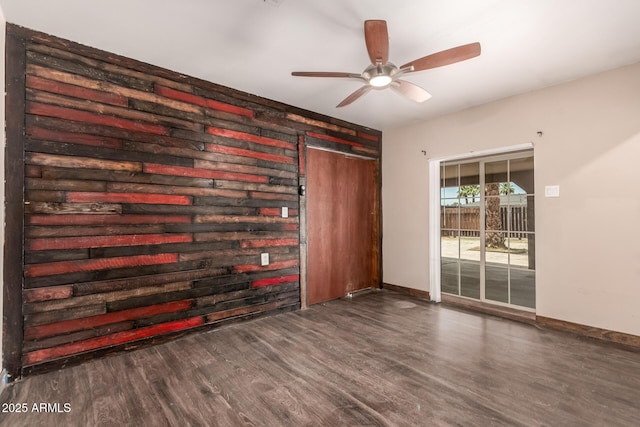 8542 N 30th Dr, Phoenix, AZ 85051 - unfurnished room with wood finished floors, ceiling fan, and baseboards