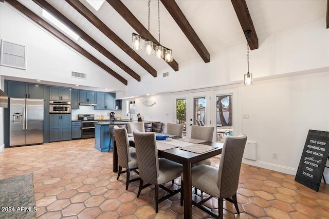 dining space featuring sink, high vaulted ceiling, light tile patterned floors, and beam ceiling