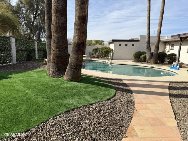 view of patio / terrace featuring a fenced in pool and french doors