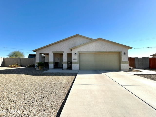 ranch-style home with a garage