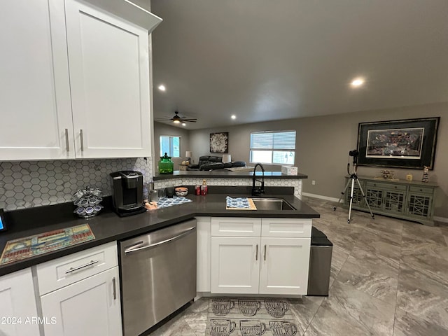 kitchen featuring dishwasher, sink, ceiling fan, white cabinetry, and kitchen peninsula