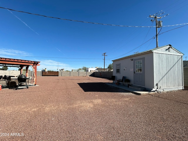 exterior space with a shed