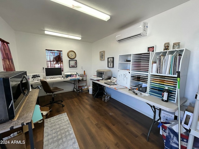 office with dark hardwood / wood-style flooring, built in desk, and a wall mounted AC