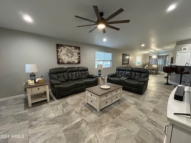 living room with ceiling fan