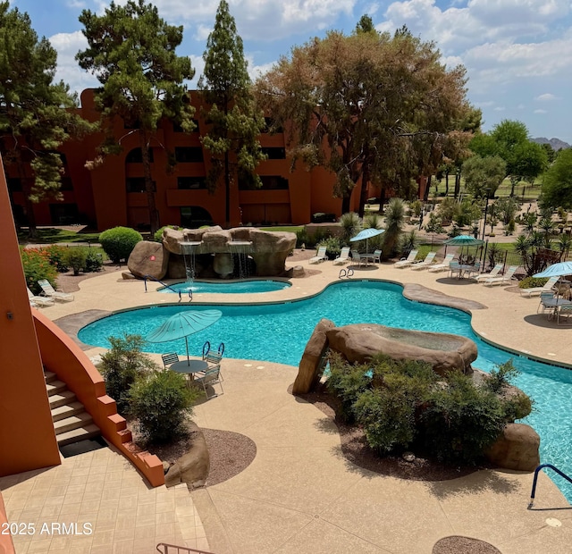 4303 E Cactus Rd Unit 235, Phoenix, AZ 85032 - community pool featuring a patio