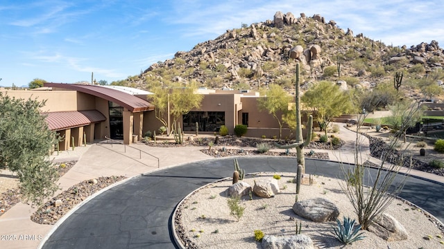 view of front of home with a mountain view