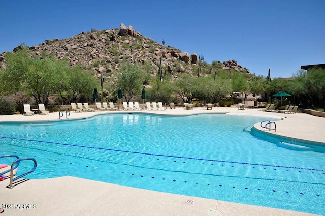 view of pool with a patio area