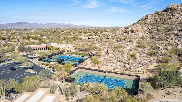 birds eye view of property with a mountain view