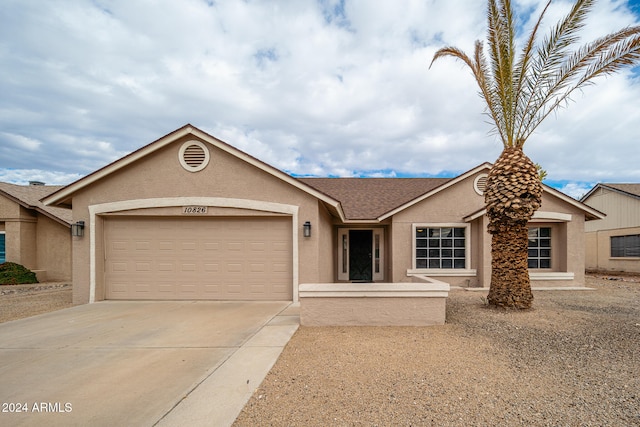 ranch-style house with a garage