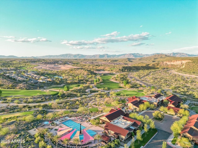 birds eye view of property featuring a mountain view