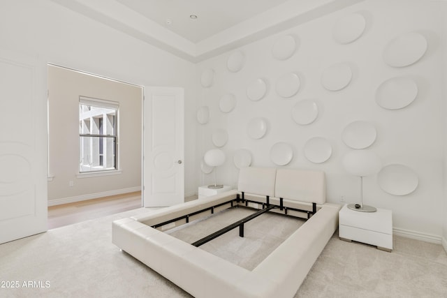 carpeted bedroom with baseboards