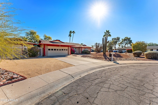 ranch-style house featuring a garage