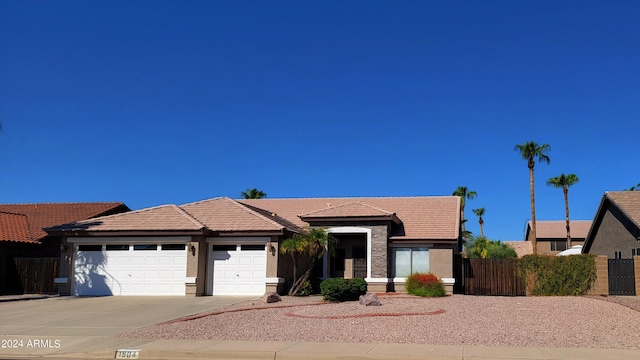 view of front of property featuring a garage