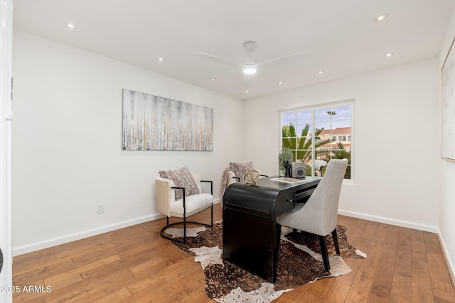 dining space with light wood finished floors, recessed lighting, and baseboards