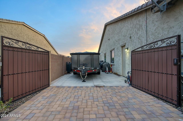 view of property exterior at dusk