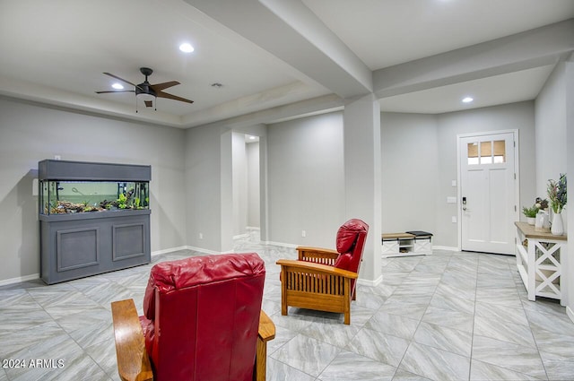 living room with ceiling fan