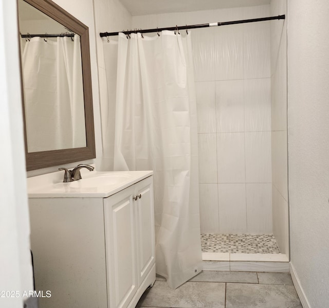 3123 W Holly St, Phoenix, AZ 85009 - bathroom with tiled shower and vanity