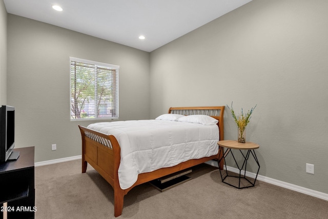 bedroom with recessed lighting, baseboards, and light colored carpet