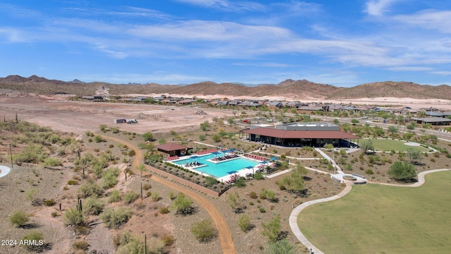 birds eye view of property featuring a mountain view