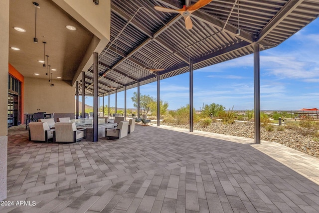 view of patio / terrace featuring a ceiling fan