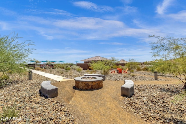 view of patio / terrace with a fire pit