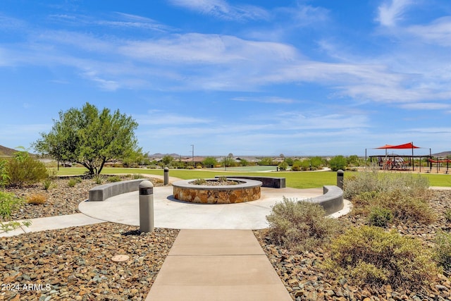 surrounding community featuring a lawn