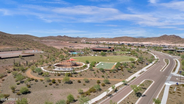 birds eye view of property featuring a mountain view