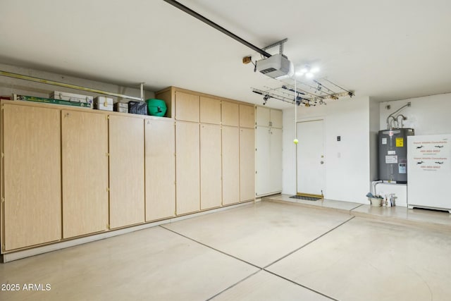 garage with water heater and a garage door opener