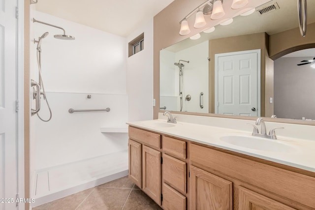 3343 W Lone Cacuts Dr, Phoenix, AZ 85027 - full bathroom with walk in shower, double vanity, and tile patterned flooring