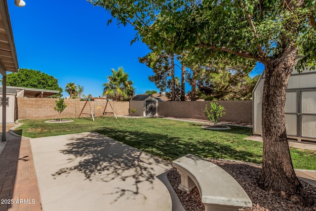 3343 W Lone Cacuts Dr, Phoenix, AZ 85027 - fenced backyard featuring a storage unit and a patio