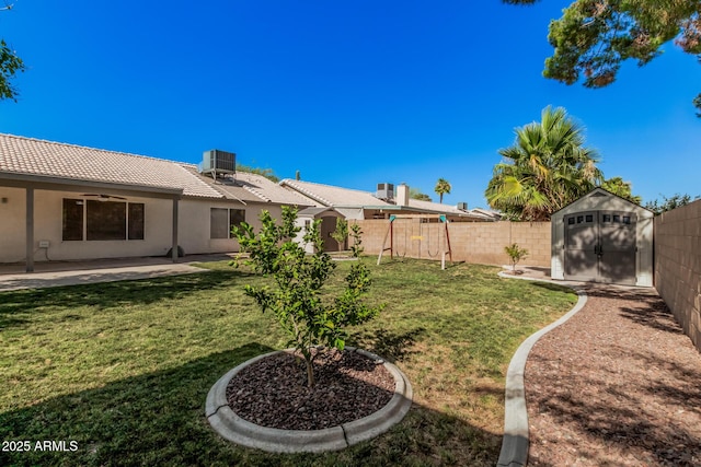 3343 W Lone Cacuts Dr, Phoenix, AZ 85027 - fenced backyard with a shed, ceiling fan, and a patio