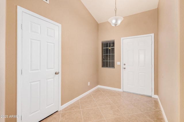 3343 W Lone Cacuts Dr, Phoenix, AZ 85027 - entryway featuring light tile patterned flooring and vaulted ceiling