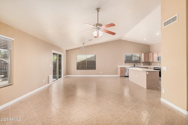 3343 W Lone Cacuts Dr, Phoenix, AZ 85027 - unfurnished living room featuring healthy amount of natural light, ceiling fan, vaulted ceiling, and light tile patterned floors