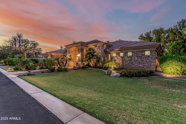1758 E Carver Rd, Tempe, AZ 85284 - view of front facade with a front yard, stone siding, and a tiled roof