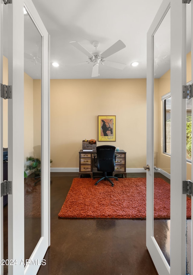 office space with french doors and ceiling fan