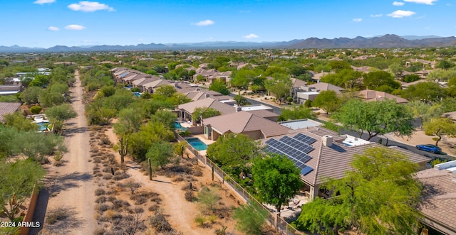 birds eye view of property featuring a mountain view