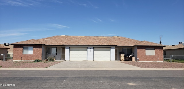 ranch-style home with a garage