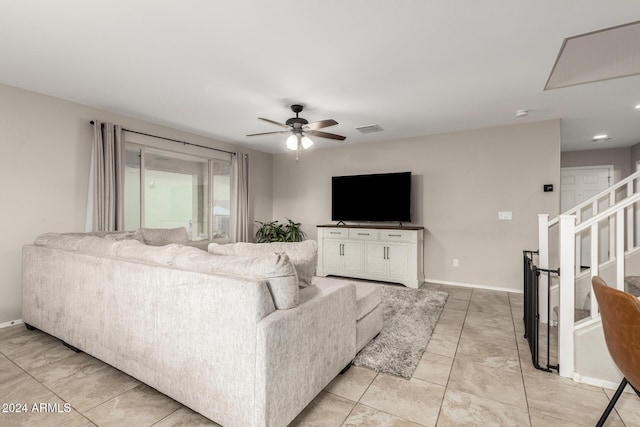 living room featuring ceiling fan