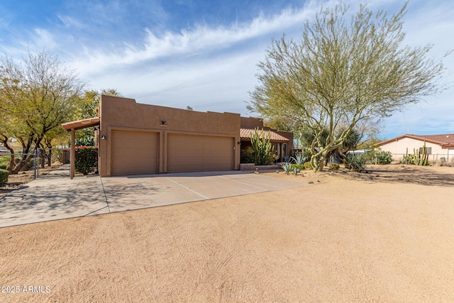 view of front of home with a garage